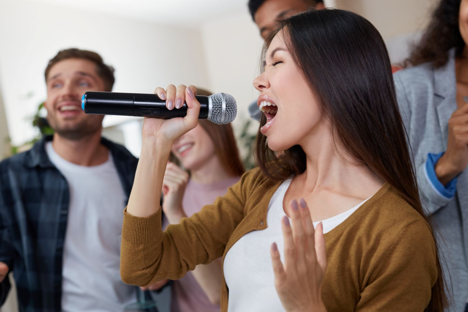 woman singing at party